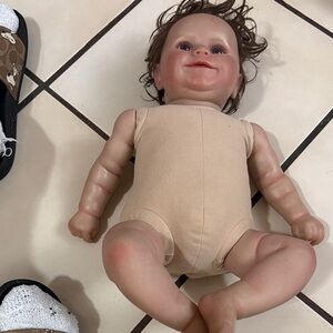 Reborn Doll with Curly Brown Hair and Soft Tan Body